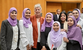 Frederika Meijer poses with Assiut University students.